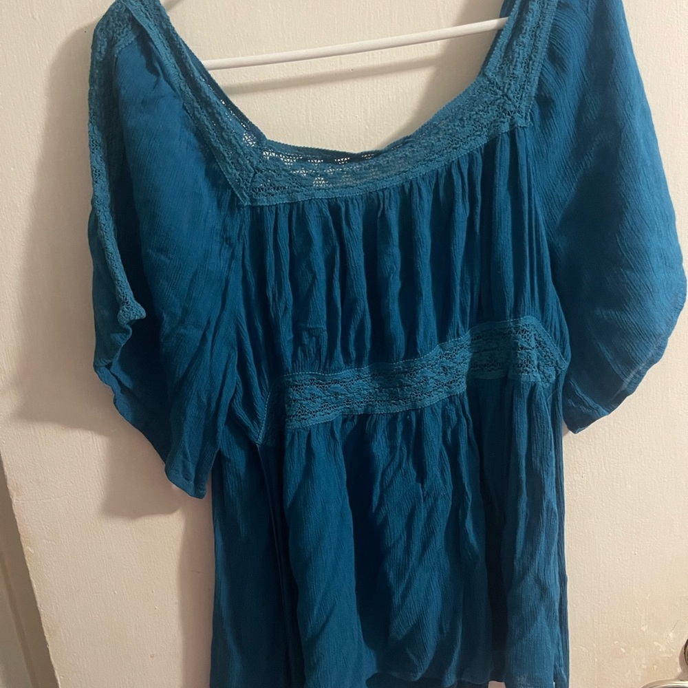 Rue 21 teal short sleeved top, crochet neck and sleeves